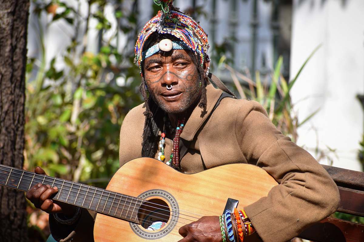 musical instrument man holding guitar leisure activities